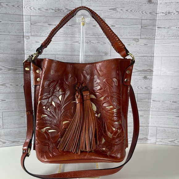 Patricia Nash Handbags - Patricia Nash Cognac Embossed Leather Shoulder Bag Cut Out Tooled Tassels
